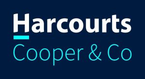 Harcourts CC Logo White Stacked.jpg